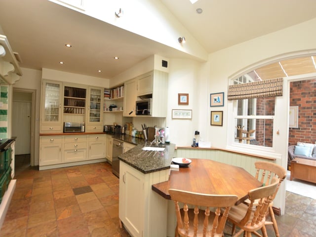 The property offers well-proportioned and versatile space, with many rooms having particularly high ceilings.
