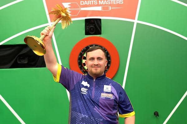 Luke Littler with the Bahrain Darts Masters trophy he won last month. Picture by BIC.