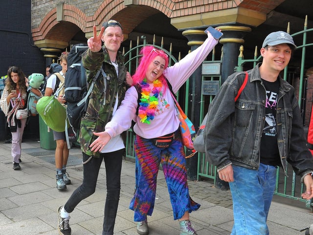 Leeds Festival fans arrive back in the city centre.