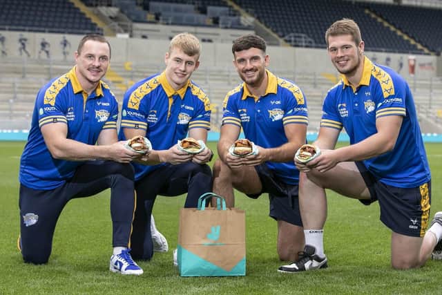 Leeds Rhinos players ready to tuck into a burger for National Burger Day, August 25