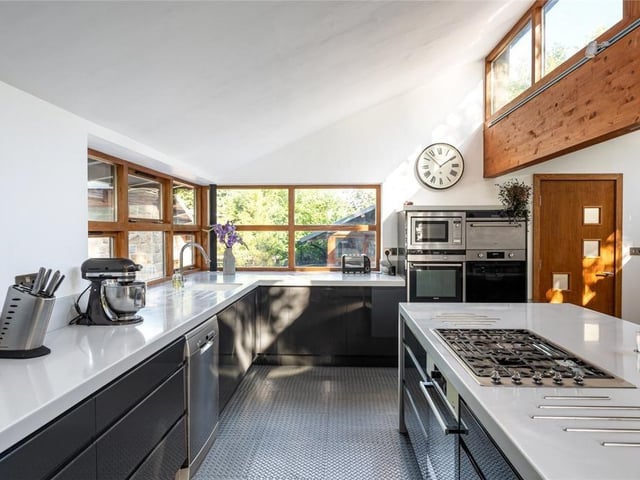 At the centre of the home lies the dining kitchen, which incorporates a wealth of quality fitted appliances and Corian work surfaces.