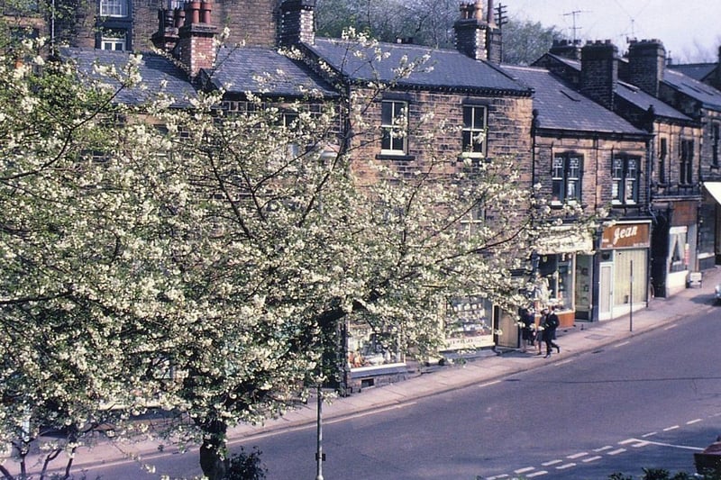 April 1968 and Queen Street is seen from Scarth Gardens, showing St. Mary's-in-the-Wood Congregational Church in the background and the junction with Queen's Promenade on the right.