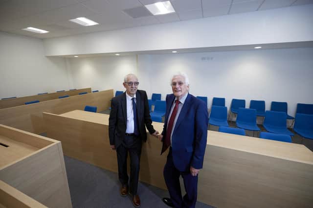 Kevin McLoughlin, senior coroner for the West Yorkshire eastern region (right), pictured in July 2023 with Les Shaw, Wakefield Council's cabinet member for resources, inside the main coroner's court at Mulberry House, Wakefield. LDRS image