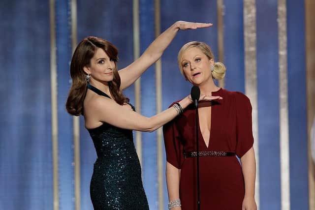 Seen here hosting the awards in 2013, Tina Fey and Amy Poehler will once again be presenting the ceremony in 2021 - though this time, they will be on opposite sides of the US (Photo: Paul Drinkwater/NBCUniversal via Getty Images)