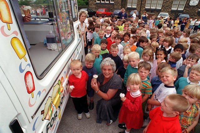 Kathleen Barron, front,  ex-pupil and classroom assistant at Cross Hall Infant School in Morley was retiring after 29 years. She treated pupils to a disco at the school and a free ice cream in July 1999.