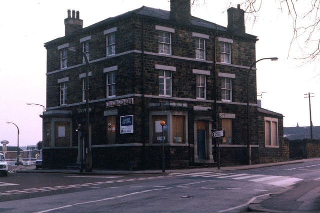 The Prospect Hotel at the junction of Victoria Road and Church Street in Morley. The photo was taken around the 1970s when the pub had been closed down by it's owners Whitbread and was to be sold off for offices; the windows are boarded up and a notice on the wall says 'Acquired for clients'. Whitbread had bought out the Prospect's previous owners, Dutton's, but having also bought BYB who owned the Nelson Arms on the other side of Church Street, they decided they did not want two pubs close together so they sold the Prospect.