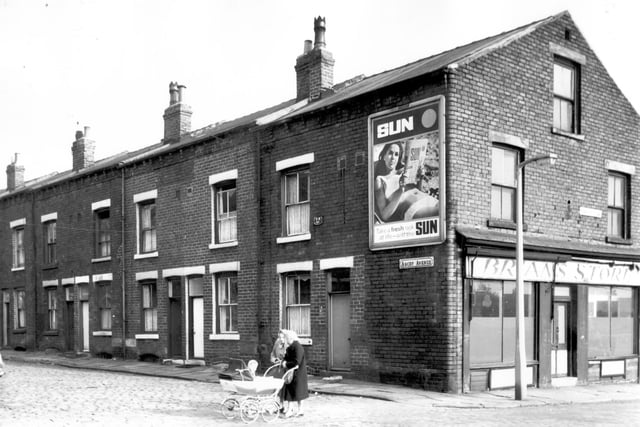 Brian's store on the corner of Ascot Avenue and Pontefract Lane in October 1966. Two women wearing headscarfs and overcoats push a pram across Ascot Avenue.