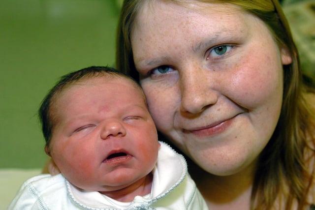 Kelly Stoddart with baby Holly, who was born at one minute past midnight on Christmas Day in 2006.