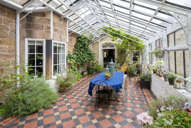 A conservatory akin to an indoor garden, that again could lend itself to a variety of uses.