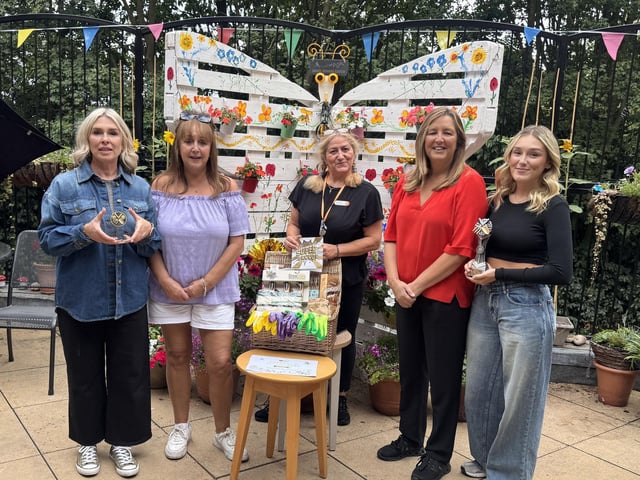 The team at HC-One’s Snapethorpe Hall Care Home with their gardening hamper prizes
