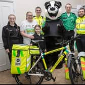 Cycle responder with Bertie Badger and volunteers