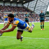 Kallum Watkins dives in to score the first of Leeds Rhinos' eight tries in their 48-30 win against against Leigh Leopards at AMT Headingley. Picture by Allan McKenzie/SWpix.com.