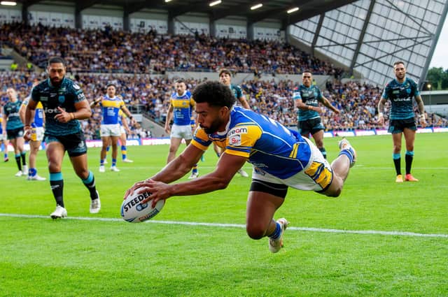 Kallum Watkins dives in to score the first of Leeds Rhinos' eight tries in their 48-30 win against against Leigh Leopards at AMT Headingley. Picture by Allan McKenzie/SWpix.com.