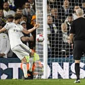 Patrick Bamford shoots but misses as Leeds toil to a 1-1 draw with Leicester (Photo by OLI SCARFF/AFP via Getty Images)