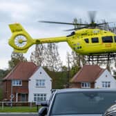 The air ambulance pictured landing at Coinsbrough Grove, Garforth, Leeds. Picture: Milton Haworth.