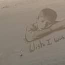 Barnardo's unveiled the giant sand portrait to highlight the impact of poverty on the nation’s children.