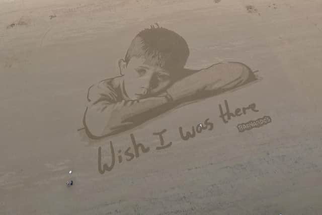 Barnardo's unveiled the giant sand portrait to highlight the impact of poverty on the nation’s children.