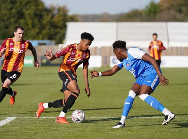 Bradford City's Bryce Hosannah (centre) takes on Tonbridge Angels' Kristian Campbell during the FA Cup first round match at Longmead Stadium, Tonbridge. PA Photo. Picture date: Saturday November 7, 2020.