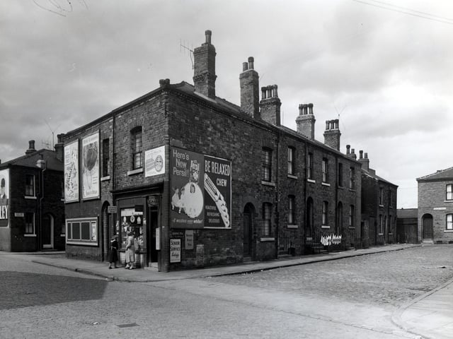 Camp Road and Oatland Avenue in July 1958. To the left, the end of Oatland Terrace can be seen. Moving right, 102a Camp Road, then 102 which is a shop, business of Solomon Goldstein. It was known as Sophies and sold a great variety of goods. Before Sunday trading became the norm, this shop attracted trade as being run by Jewish people it opened on a Sunday. It was on the edge of the Camp Road area.
