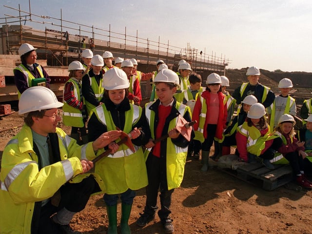 Some 25 pupils of Barwick in Elmet C of E Primary paid a visit to the construction sites of the A1-M1 link road in April 1997. Pictured at the Colton interchange are Lisa Collett and Daniel Binn with their guide, Andrew Waller, public liaison manager with the contractors Kvaerner Balfour Beatty JV.