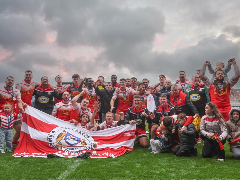 East Leeds players celebrate with their families following the promotion-clinching win against Oulton Raiders in the National Conference Division One play-off final at Wakefield Trinity's DIY Kitchens Stadium, Belle Vue.