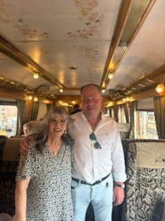 On the write lines ... author Milly aboard the Northern Belle with train owner David Pitts