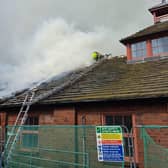 The blaze started accidentally when some roof insulation caught fire during renovation work.