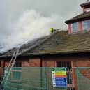 The blaze started accidentally when some roof insulation caught fire during renovation work.