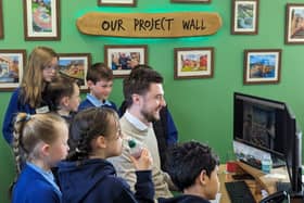 The children begin their design with Adam Press, Playscheme's head of design.
