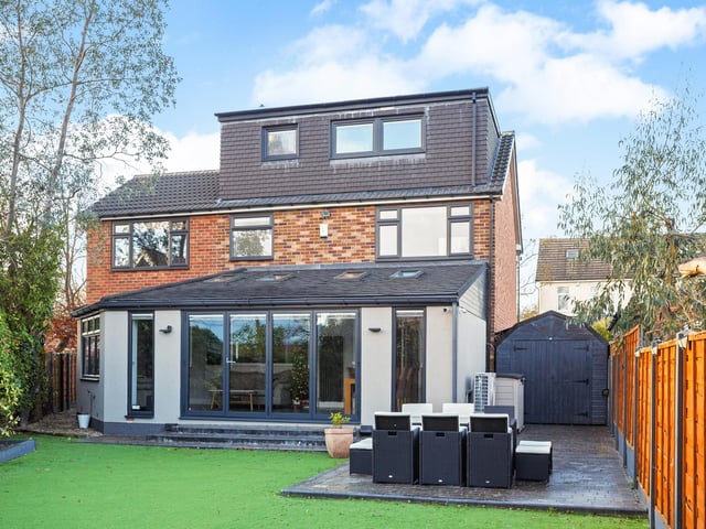 To the outside there is a gated driveway accessed via remote control, with ample off-street parking for several vehicles.