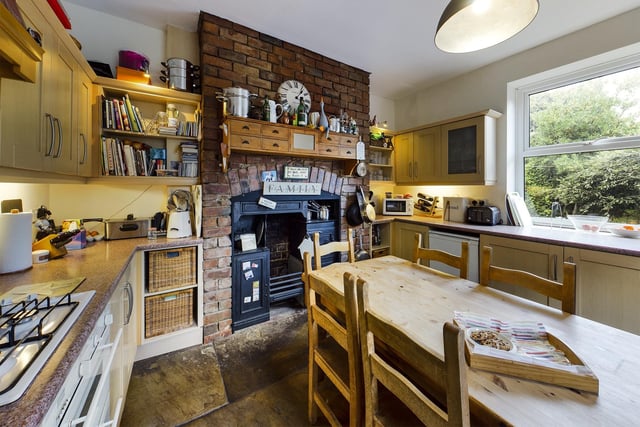A homely kitchen environment with a Victorian stove.