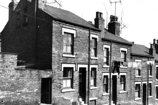 Back-to-back houses on the even numbered side of Prosperity Street in June 1967. Washing hangs across the street. These houses are due for demolition in line with a citywide slum clearance programme.