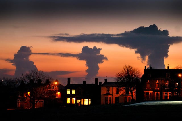 Strange cloud formations over houses in the Beeston Hill in December 2005 caused by the power stations at Ferrybridge, Eggborough and Drax.