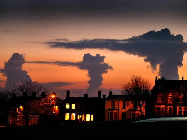 Strange cloud formations over houses in the Beeston Hill in December 2005 caused by the power stations at Ferrybridge, Eggborough and Drax.