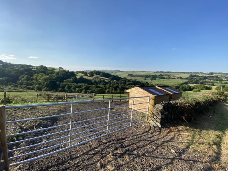 Land and stables at Spout Lane, opposite White Acres Farm - upper field - in Stannington, has a guide price of £45,000. The auction brochure says: "Freehold grazing amounting to 1.77 acres with two new timber stables, gated entrance and fencing, occupying a delightful location overlooking the Loxley Valley."