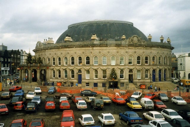 The Corn Exchange looking from the car park across Cloth Hall Street. On the right, the white building is the former Assembly Rooms known as Waterloo House in Assembly Street. Near the elaborate entrance to the Corn Exchange on the left Duncan Street, New Market Street and Call Lane meet.