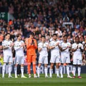 LEEDS, ENGLAND - APRIL 09: Players of Leeds United observe a minute of applause in honour of Kevin Speight and Christopher Loftus prior to the Premier League match between Leeds United and Crystal Palace at Elland Road on April 09, 2023 in Leeds, England. (Photo by Stu Forster/Getty Images)