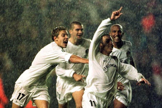 Lee Bowyer and teammates celebrate under a torrential downpour as Leeds defeat Milan at Elland Road. (Picture Credit: Laurence Griffiths/ALLSPORT)