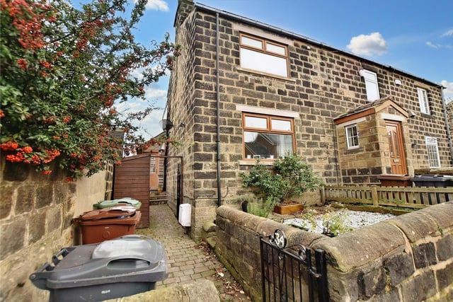 This deceptively spacious two bedroom cottage in Horsforth is on the market for £265,000.