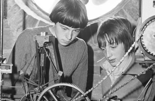 Are you one of these two lads taking an interest in the new bell tower?