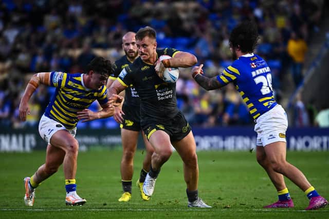 Leeds Rhinos' Cooper Jenkins, seen in action against Warrington Wolves last month, trained today (Wednesday) despite picking up an injury away to Catalans Dragons four days ago. Picture by Olly Hassell/SWpix.com.