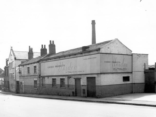 The factory premises of Unidec Products on Tong Road who produced 'The World's finest sugar decorations'. The buildings in view had originally been a listings mill producing and dying a strong yarn for use in weaving. The mill was known as Tong Road Mill. Pictured in June 1965.