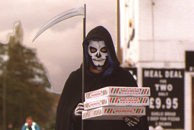 This is artist and face painter Bob Milner who was delivering food for Cafe Pizza and collecting funds for Wheatfields Hospice while on his ghostly travels dressed as the Grim Reaper on Halloween.