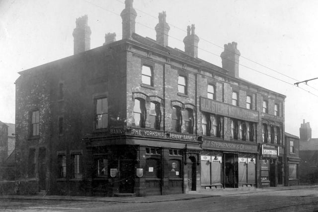The Yorkshire Penny Bank is on the corner with Stafford Street. Next to J.J. Stephenson, drappers and Gallons, grocers above Gallons is Bramham and Gale, rent collectors and estate agents. Pictured in March 1929.