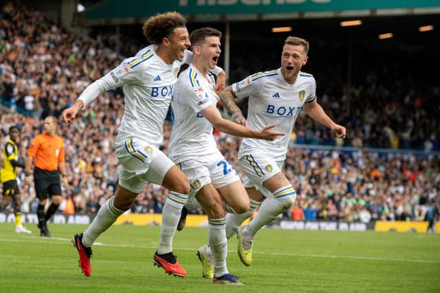 LONG WAIT OVER: Leeds United star Sam Byram, centre, celebrates netting in Leeds United colours for the first time since December 2015 along with team mates Ethan Ampadu, left, and captain Liam Cooper, right, to put the Whites 2-0 up in Saturday's Championship clash against at Watford at Elland Road. Picture by Bruce Rollinson.