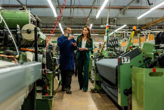 Her Royal Highness, the Princess of Wales, visited A.W Hainsworth & Sons Ltd, Spring Valley Mills in Pudsey in September. Pictured is the The Princess of Wales chatting with Zeb Akhtar, senior weaver trainer, during her visit around the factory.