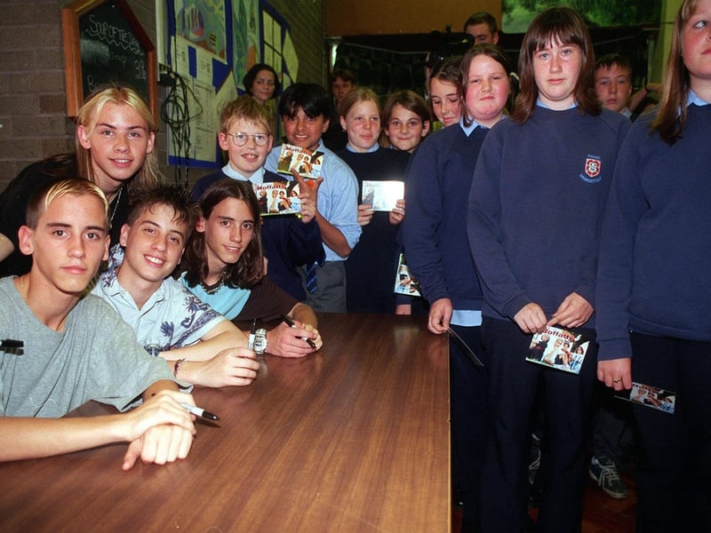 Fans gather to get autographs of The Moffatts after they performed at Pudsey Grangefield School in September 1998. They were a Canadian pop/rock country band composed of brothers Scott, Clint, Bob and Dave.