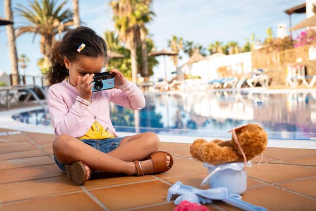 TUI puts kids in charge of snapping their own holiday pics as research reveals printed photos are the key to unlocking lasting childhood memories.