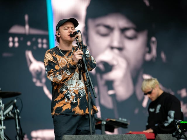Australian three-piece rock band DMA's on stage