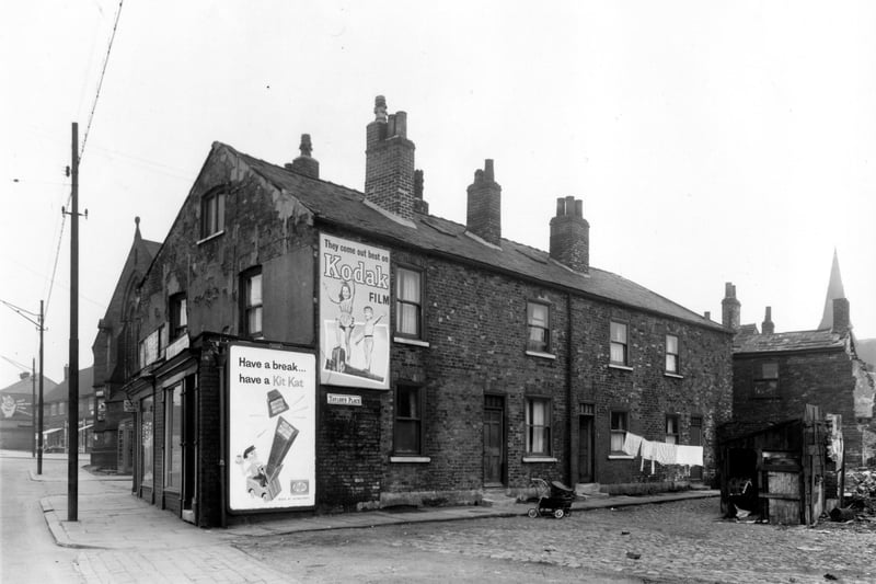 Taylor's Place and Balm Road in April 1959. On the left edge of this view shops on Belle Isle Road are just visible. Moving right along Balm Road the end of St Oswald's Mission Church on Moor Road is in view, then the junction with Lower Carr Place.